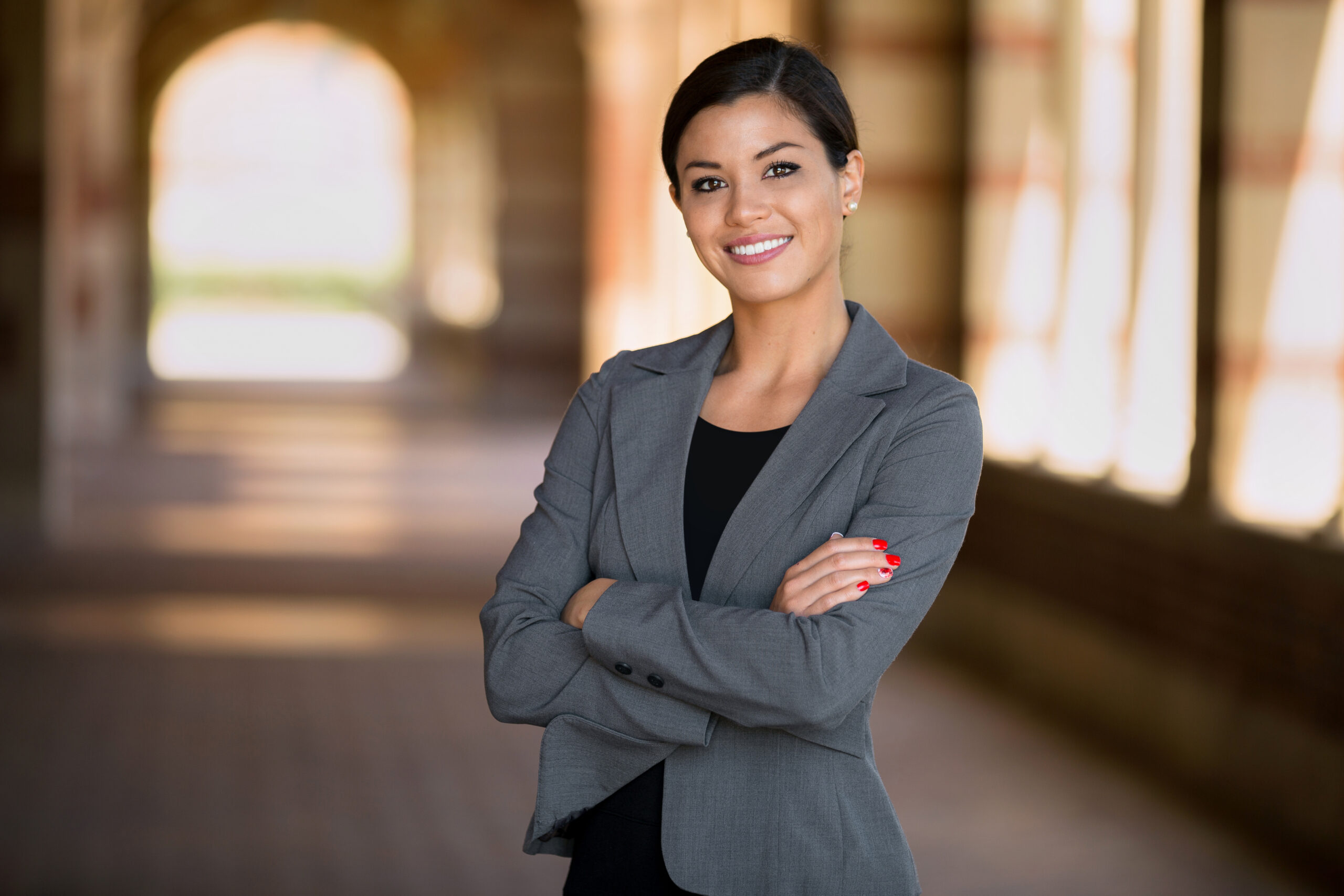 Happy,Successful,Smiling,Business,Woman,Executive,Female,In,A,Suit