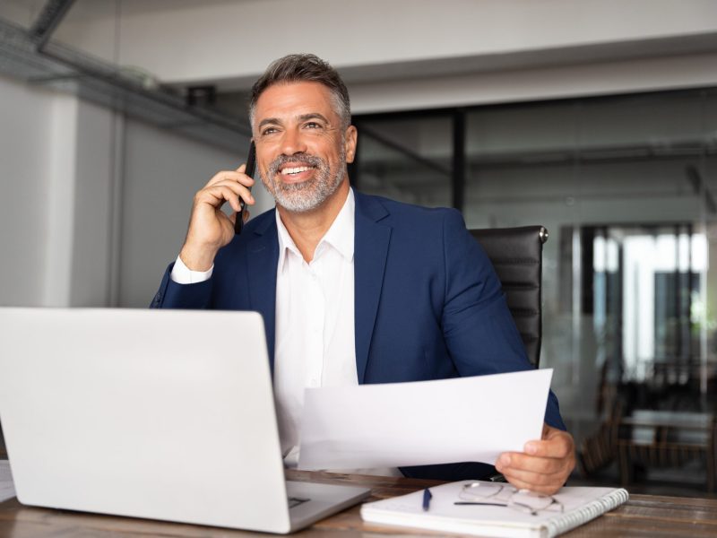 Happy,Smile,Hispanic,Businessman,Talking,Phone,And,Hear,Good,News,