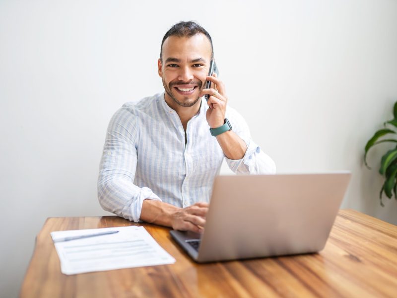 A,Corporate,Portrait,Young,Mexican,Attractive,Businessman,Working,At,Modern
