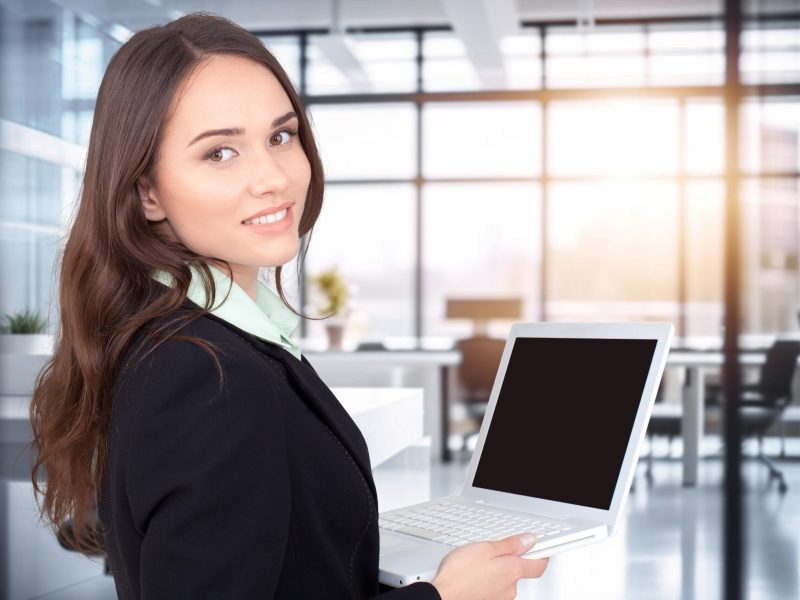 Smiling,Happy,Young,Business,Woman,Holding,Laptop